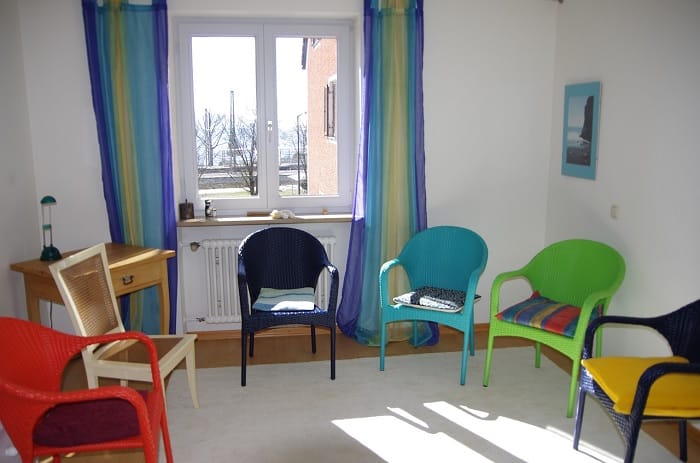 Empty chairs set up for a group therapy session at a drug and alcohol rehab in the West Midlands