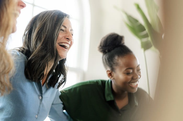 People laughing together at a drug and alcohol rehab in the West Midlands