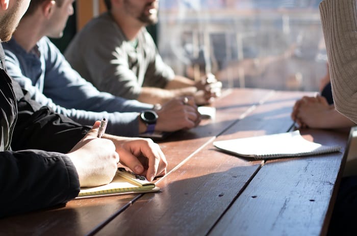 People taking notes at a drug and alcohol rehab in Staffordshire