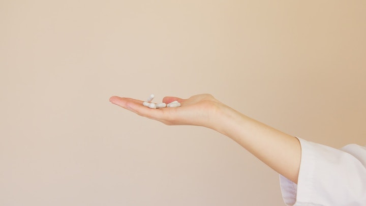 hand holding medication