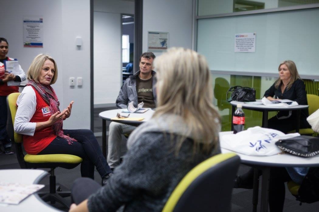 People in a therapy room talking
