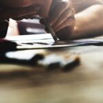 Man snorting drugs on the table