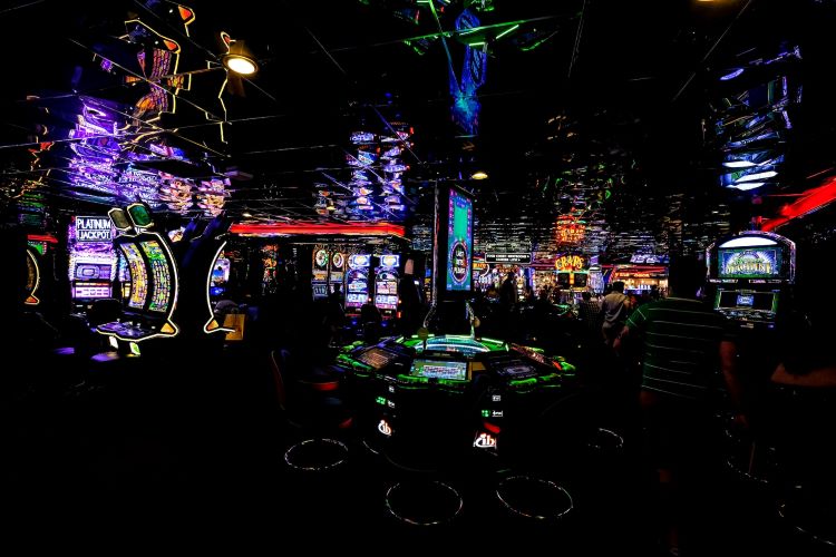 A dark casino lit by the bright lights of the games in Kirklees