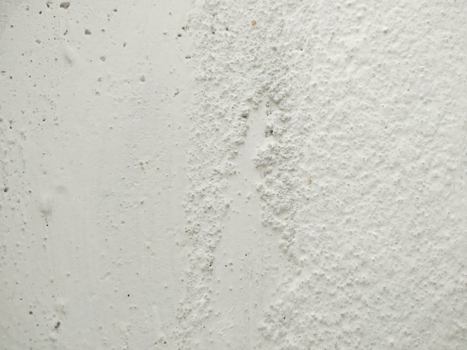 A white, textured wall