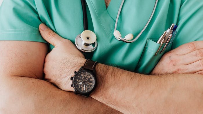 A doctor with a stethoscope discussing Fentanyl addiction