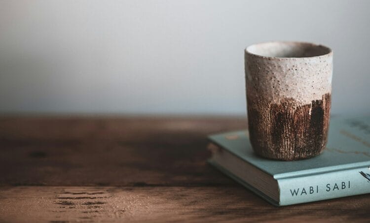 A wabi-sabi book and cup