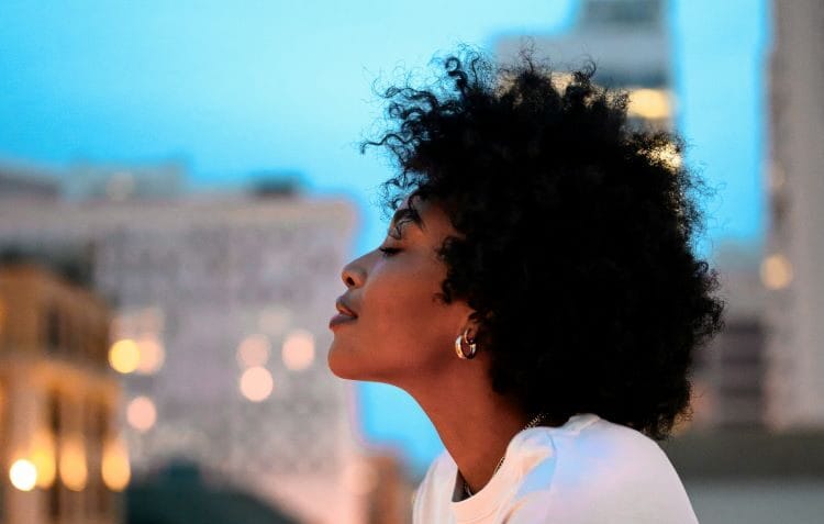 A woman with her eyes closed