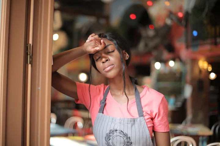 Woman experiencing fatigue from bulimia