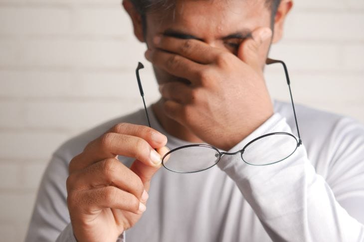 Man holding his face suffering from pain due to monkey dust