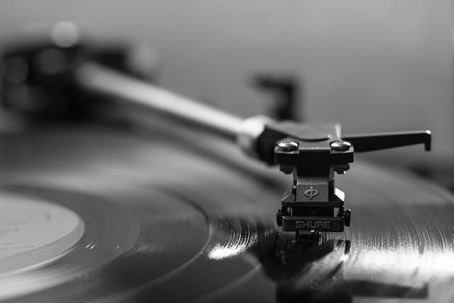 Black and white photo of a vinyl disk played during music therapy