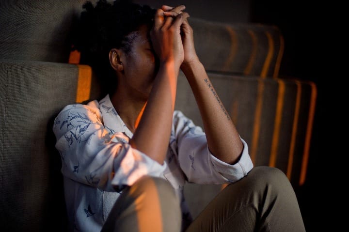 Woman suffering from the psychological effects of pink cocaine addiction