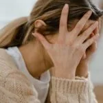 Someone struggling with their mental health after taking ketamine